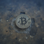 Charles Schwab logo with Bitcoin and Ethereum cryptocurrency symbols